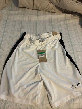 Kids Nike White Shorts with Black Trim and Swoosh